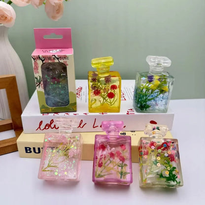 Glitter Flower Perfume Bottle Squishy – Stress Relief Toy