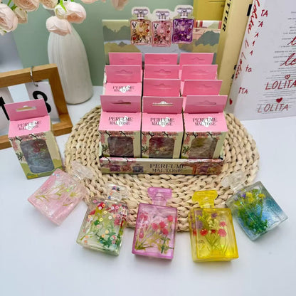 Glitter Flower Perfume Bottle Squishy – Stress Relief Toy